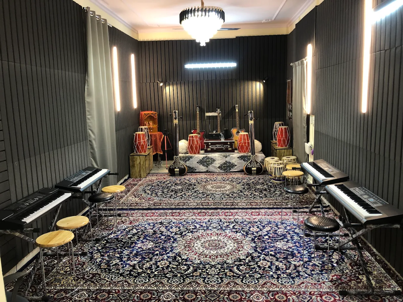 RaagRas studio interior with keyboards, tablas, tanpuras and guitars
